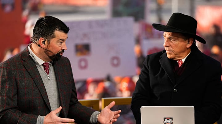 Ohio State head coach Ryan Day talks to Nick Saban on the set of ESPN College GameDay prior to the College Football Playoff first round game between the Ohio State Buckeyes and Tennessee Volunteers in Columbus on Dec. 21, 2024.