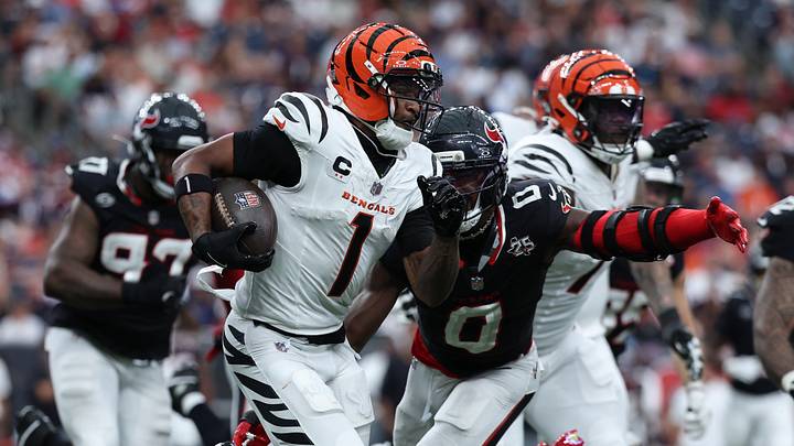Sep 20, 2026; Houston, Texas, USA; Cincinnati Bengals wide receiver Ja'Marr Chase (1) runs after a catch against Houston Texans linebacker Azeez Al-Shaair (0) during the third quarter at Reliant Stadium. Mandatory Credit: Troy Taormina-Imagn Images Sep 20, 2026; Houston, Texas, USA; Cincinnati Bengals wide receiver Ja'Marr Chase (1) runs after a catch against Houston Texans linebacker Azeez Al-Shaair (0) during the third quarter at Reliant Stadium. Mandatory Credit: Troy Taormina-Imagn Images