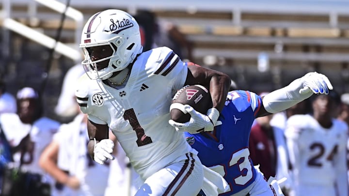 Mississippi State Bulldogs wide receiver Kelly Akharaiyi (1) runs the ball against the Florida Gators during the fourth quarter at Davis Wade Stadium at Scott Field. Mississippi State Bulldogs wide receiver Kelly Akharaiyi (1) runs the ball against the Florida Gators during the fourth quarter at Davis Wade Stadium at Scott Field.