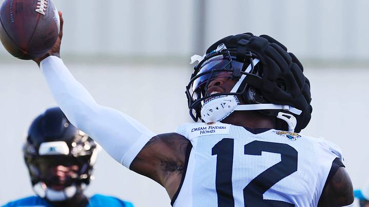 Jacksonville Jaguars wide receiver/cornerback Travis Hunter (12) catches a soft toss during Day 15 of NFL training camp at the Miller Electric Center on Tuesday, Aug. 18, 2026, in Jacksonville, Fla.