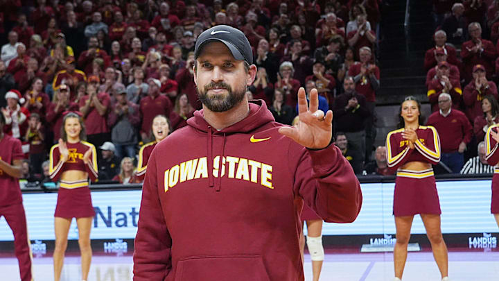 Iowa State football coach Jimmy Rogers speaks during a timeout in the first half in the Iowa State and Iowa men’s basketball Cy-Hawk series at Hilton coliseum on Dec. 11, 2025, in Ames, Iowa.