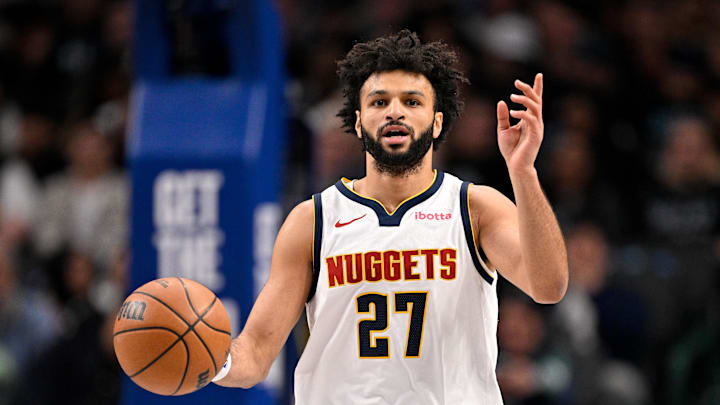 Jan 14, 2026; Dallas, Texas, USA; Denver Nuggets guard Jamal Murray (27) brings the ball up court against the Dallas Mavericks during the first quarter at the American Airlines Center.
