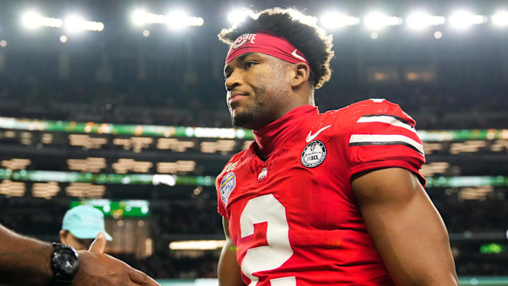 Ohio State Buckeyes defensive back Caleb Downs leaves the field following the Cotton Bowl at AT&T Stadium