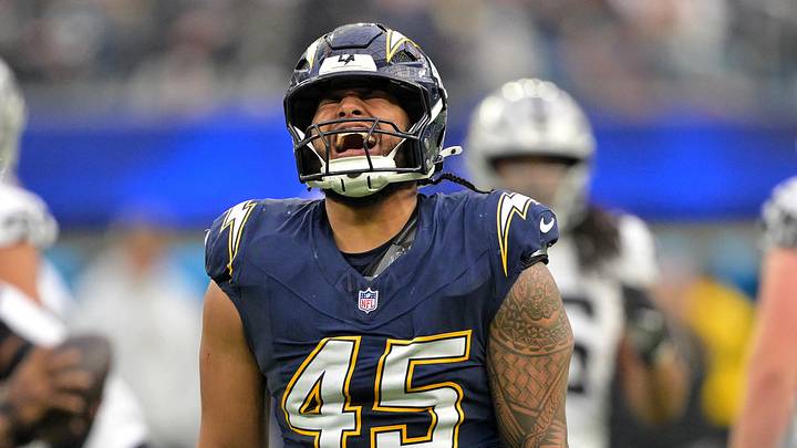 Nov 30, 2025; Inglewood, California, USA; Los Angeles Chargers linebacker Tuli Tuipulotu (45) reacts after a sack against the Las Vegas Raiders during the second half at SoFi Stadium. Mandatory Credit: Jayne Kamin-Oncea-Imagn Images