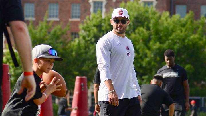 Former Oklahoma quarterback Baker Mayfield oversees a drill at his youth football camp.