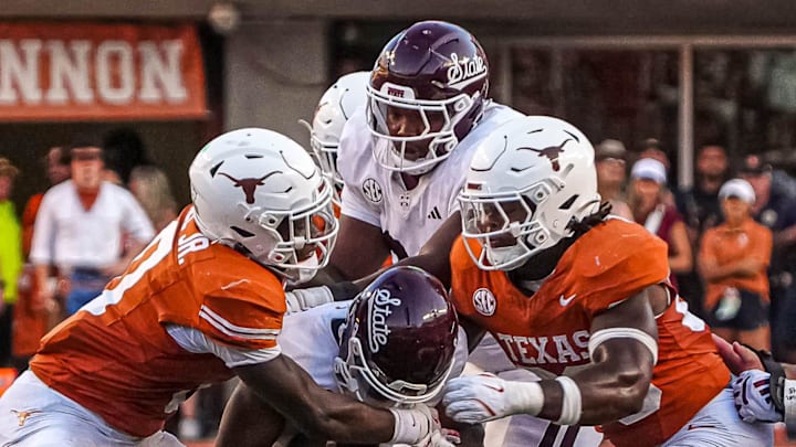 Mississippi State quarterback Michael Van Burn Jr. (0) is sacked by Texas Longhorns linebacker Anthony Hill Jr. (0) and edge rusher Barryn Sorrell (88) during the game at Darrell K Royal-Texas Memorial Stadium in Austin Saturday, Sept. 28, 2024. Mississippi State quarterback Michael Van Burn Jr. (0) is sacked by Texas Longhorns linebacker Anthony Hill Jr. (0) and edge rusher Barryn Sorrell (88) during the game at Darrell K Royal-Texas Memorial Stadium in Austin Saturday, Sept. 28, 2024.
