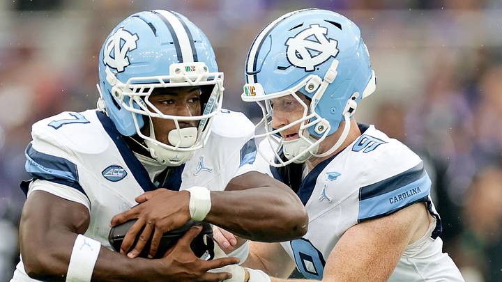 Aug 29, 2026; Dublin, Co. Dublin, IRL; North Carolina Tar Heels quarterback Billy Edwards Jr. (9) hands off the ball to running back Benjamin Hall (7) in the first half against the TCU Horned Frogs at Aviva Stadium. Mandatory Credit: Laszlo Geczo-Imagn Images Aug 29, 2026; Dublin, Co. Dublin, IRL; North Carolina Tar Heels quarterback Billy Edwards Jr. (9) hands off the ball to running back Benjamin Hall (7) in the first half against the TCU Horned Frogs at Aviva Stadium. Mandatory Credit: Laszlo Geczo-Imagn Images