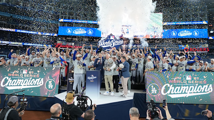 Nov 1, 2025; Toronto, Ontario, CAN; The Los Angeles Dodgers react after defeating the Toronto Blue Jays in the eleventh inning for game seven of the 2025 MLB World Series at Rogers Centre. Mandatory Credit: Nick Turchiaro-Imagn Images
