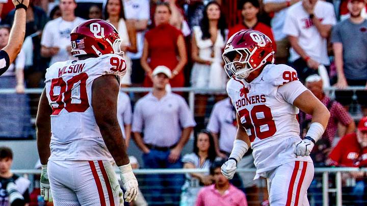 Oklahoma defensive tackle Trent Wilson celebrates with Jake Kreul after logging a sack against Georgia. Oklahoma defensive tackle Trent Wilson celebrates with Jake Kreul after logging a sack against Georgia.