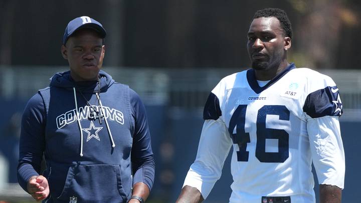 Dallas Cowboys tight ends coach Lunda Wells and tight end Michael Trigg at training camp at River Ridge Playing Fields. Dallas Cowboys tight ends coach Lunda Wells and tight end Michael Trigg at training camp at River Ridge Playing Fields.
