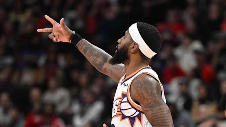 Mar 13, 2026; Toronto, Ontario, CAN;  Phoenix Suns forward Royce O'Neale (00) gestures after making a three point basket against the Toronto Raptors in the second half at Scotiabank Arena. Mandatory Credit: Dan Hamilton-Imagn Images