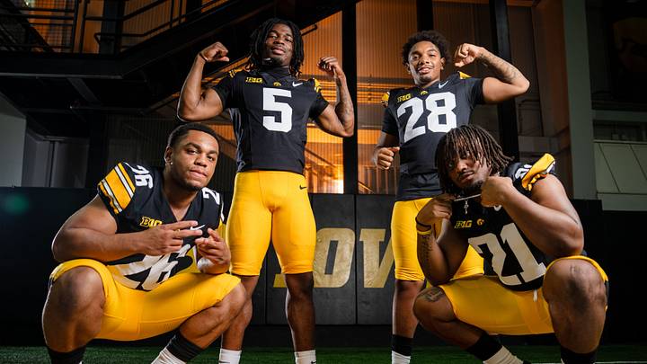 Iowa running back Xavier Williams (26) Iowa running back Nathan McNeil (5) Iowa running back Kamari Moulton (28) and Iowa running back L.J. Phillips Jr. (21) stand for a portrait during Hawkeye football media day, Friday, Aug. 14, 2026, in Iowa City. Iowa running back Xavier Williams (26) Iowa running back Nathan McNeil (5) Iowa running back Kamari Moulton (28) and Iowa running back L.J. Phillips Jr. (21) stand for a portrait during Hawkeye football media day, Friday, Aug. 14, 2026, in Iowa City.