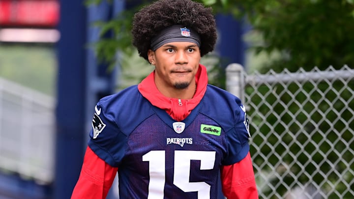 Jul 24, 2024; Foxborough, MA, USA; New England Patriots safety Marte Mapu (15) walks to the practice field during training camp at Gillette Stadium. Mandatory Credit: Eric Canha-Imagn Images
