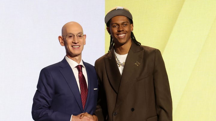 Jun 26, 2024; Brooklyn, NY, USA; Cody Williams poses for photos with NBA commissioner Adam Silver after being selected in the first round by the Utah Jazz in the 2024 NBA Draft at Barclays Center. Mandatory Credit: Brad Penner-USA TODAY Sports