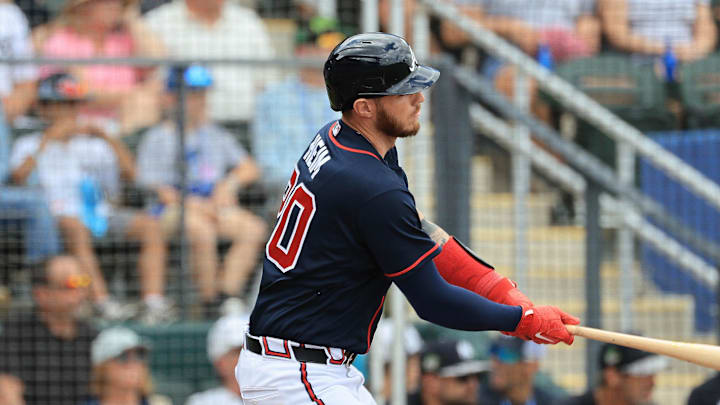 Mar 13, 2026; North Port, Florida, USA;  AAtlanta Braves catcher Jonah Heim (20) hits an RBI single during the first inning against the New York Yankees at CoolToday Park. Mandatory Credit: Kim Klement Neitzel-Imagn Images