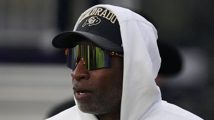 Sep 19, 2026; Evanston, Illinois, USA;  Colorado Buffaloes head coach Deion Sanders takes the field with his team for warmups before the game against the Northwestern Wildcats at Northwestern Medicine Field at Martin Stadium.