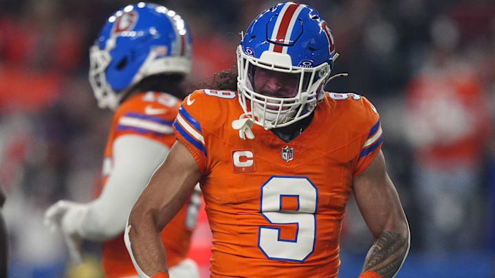 Nov 6, 2025; Denver, Colorado, USA; Denver Broncos safety Talanoa Hufanga (9) reacts against the Las Vegas Raiders during the first half at Empower Field at Mile High. 