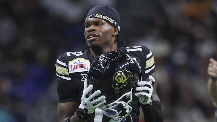 Dec 28, 2024; San Antonio, TX, USA; Colorado Buffaloes wide receiver Travis Hunter (12) reacts after a penalty is called during the second quarter against the Brigham Young Cougars at Alamodome. Mandatory Credit: Troy Taormina-Imagn Images Dec 28, 2024; San Antonio, TX, USA; Colorado Buffaloes wide receiver Travis Hunter (12) reacts after a penalty is called during the second quarter against the Brigham Young Cougars at Alamodome. Mandatory Credit: Troy Taormina-Imagn Images