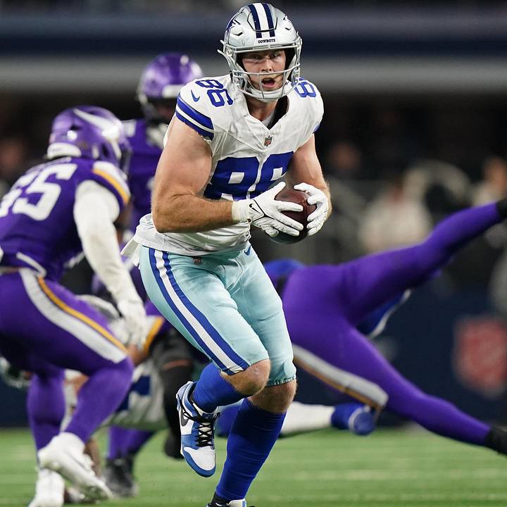 Dallas Cowboys tight end Luke Schoonmaker runs after the catch against the Minnesota Vikings.