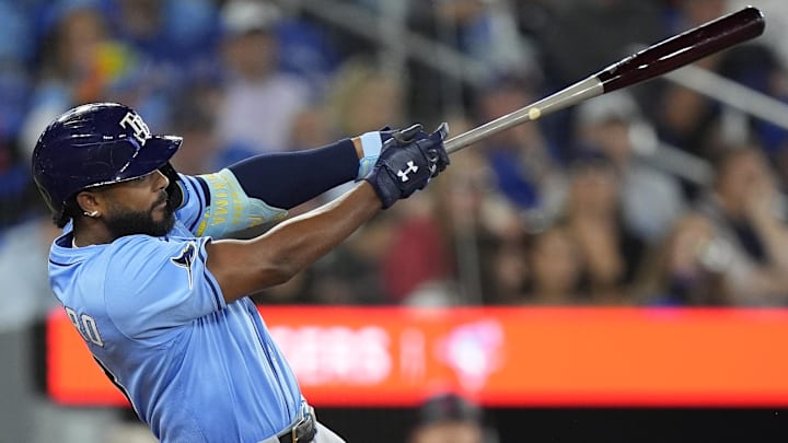 Sep 26, 2025; Toronto, Ontario, CAN; Tampa Bay Rays third baseman Junior Caminero (13) hits a single against the Toronto Blue Jays during the eighth inning at Rogers Centre. Sep 26, 2025; Toronto, Ontario, CAN; Tampa Bay Rays third baseman Junior Caminero (13) hits a single against the Toronto Blue Jays during the eighth inning at Rogers Centre.