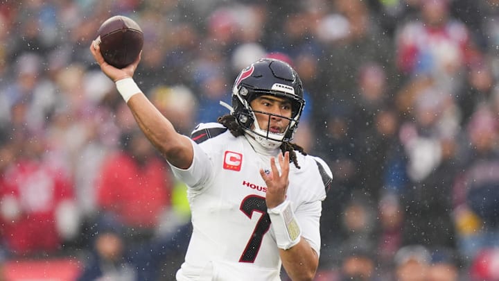 Jan 18, 2026; Foxborough, MA, USA; Houston Texans quarterback C.J. Stroud (7) throws in the first quarter against the New England Patriots in an AFC Divisional Round game at Gillette Stadium. Mandatory Credit: Brian Fluharty-Imagn Images