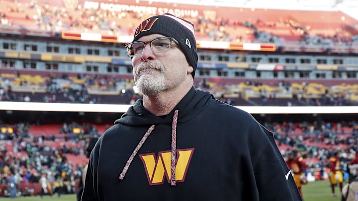 Dec 22, 2024; Landover, Maryland, USA; Washington Commanders head coach Dan Quinn walks off the field after the Washington Commanders beat the Philadelphia Eagles at Northwest Stadium. Mandatory Credit: Peter Casey-Imagn Images