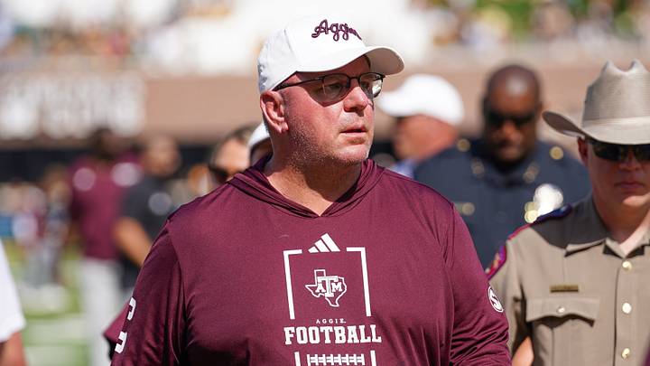 Texas A&M Aggies head coach Mike Elko leaves the field after the first half against the Missouri Tigers during the first half of the game at Faurot Field at Memorial Stadium Texas A&M Aggies head coach Mike Elko leaves the field after the first half against the Missouri Tigers during the first half of the game at Faurot Field at Memorial Stadium