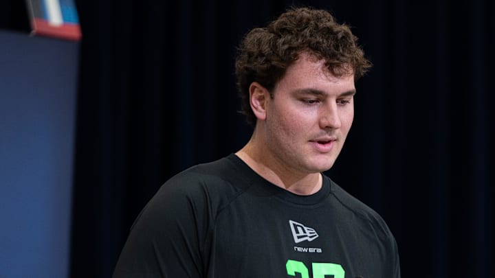 Kansas State offensive lineman Sam Hecht (OL27) speaks to members of the media 