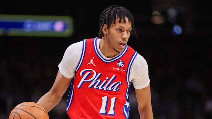Mar 23, 2025; Atlanta, Georgia, USA; Philadelphia 76ers guard Jeff Dowtin Jr. (11) dribbles against the Atlanta Hawks in the first quarter at State Farm Arena. Mandatory Credit: Brett Davis-Imagn Images