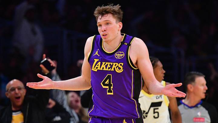 Los Angeles Lakers guard Dalton Knecht (4) react (Mandatory Credit: Gary A. Vasquez-Imagn Images)