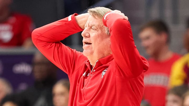 Nov 9, 2025; Charlotte, North Carolina, USA; NC State Wolfpack head coach Wes Moore reacts to a play against the Southern California Trojans during the second quarter of the Ally Tipoff game at Spectrum Center. Mandatory Credit: Cory Knowlton-Imagn Images