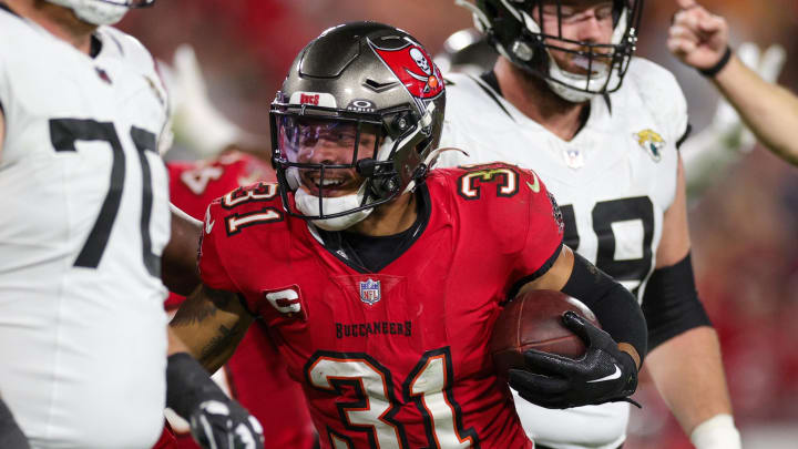 Dec 24, 2023; Tampa, Florida, USA;  Tampa Bay Buccaneers safety Antoine Winfield Jr. (31) reacts after recovering a fumble against the Jacksonville Jaguars in the fourth quarter at Raymond James Stadium. Mandatory Credit: Nathan Ray Seebeck-USA TODAY Sports