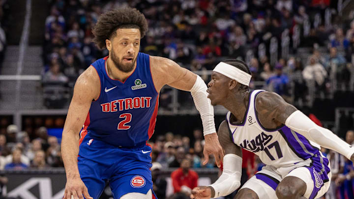 Jan 25, 2026; Detroit, Michigan, USA; Sacramento Kings guard Dennis Schroder (17) defends against Detroit Pistons guard Cade Cunningham (2) during the during the second half at Little Caesars Arena.