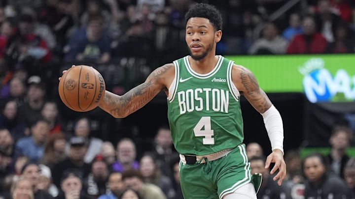 Dec 7, 2025; Toronto, Ontario, CAN; Boston Celtics guard Anfernee Simons (4) dribbles the ball against the Toronto Raptors during the first half at Scotiabank Arena. Dec 7, 2025; Toronto, Ontario, CAN; Boston Celtics guard Anfernee Simons (4) dribbles the ball against the Toronto Raptors during the first half at Scotiabank Arena.
