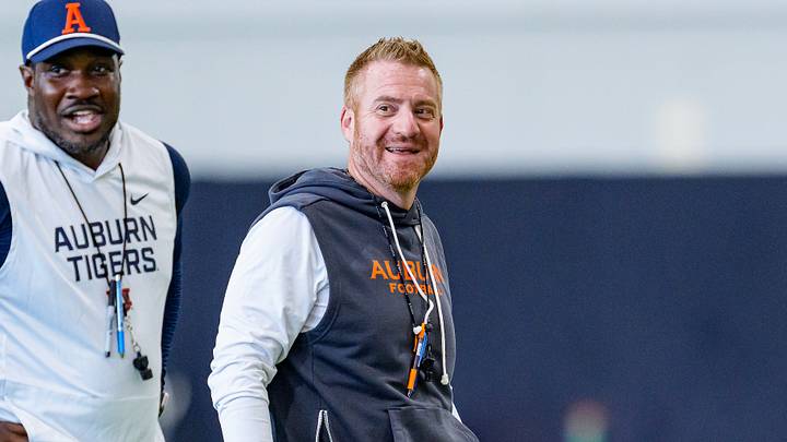 Associate Head Coach, Co-Offensive Coordinator & Wide Receivers Coach Kodi Burns and Auburn Head Coach Alex Golesh during a Fall Camp practice Associate Head Coach, Co-Offensive Coordinator & Wide Receivers Coach Kodi Burns and Auburn Head Coach Alex Golesh during a Fall Camp practice
