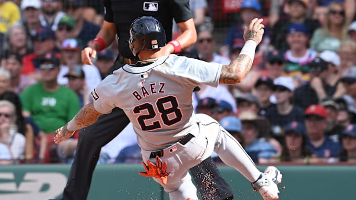 Jun 2, 2024; Boston, Massachusetts, USA;  Detroit Tigers shortstop Javier Baez (28) scores during the tenth inning against the Boston Red Sox at Fenway Park.