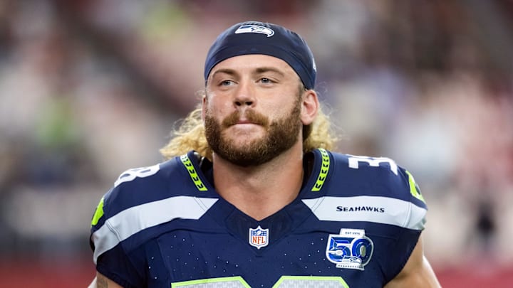 Sep 25, 2025; Glendale, Arizona, USA; Seattle Seahawks fullback Brady Russell (38) against the Arizona Cardinals at State Farm Stadium. Mandatory Credit: Mark J. Rebilas-Imagn Images