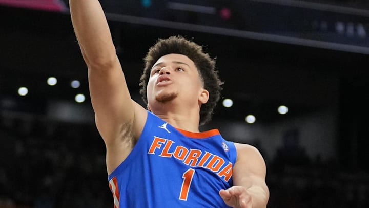 Apr 5, 2025; San Antonio, TX, USA;  Florida Gators guard Walter Clayton Jr. (1) shoots against the Auburn Tigers in the semifinals of the men's Final Four of the 2025 NCAA Tournament at the Alamodome. Mandatory Credit: Robert Deutsch-Imagn Images