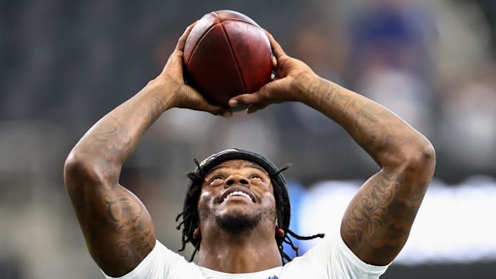 Aug 16, 2025; Arlington, Texas, USA;  Baltimore Ravens quarterback Lamar Jackson (8) warms up before the game against the Dallas Cowboys at AT&T Stadium. Mandatory Credit: Kevin Jairaj-Imagn Images