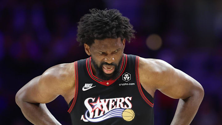 Feb 26, 2026; Philadelphia, Pennsylvania, USA; Philadelphia 76ers center Joel Embiid (21) reacts while clutching his body after a play against the Miami Heat during the second quarter at Xfinity Mobile Arena. Mandatory Credit: Bill Streicher-Imagn Images Feb 26, 2026; Philadelphia, Pennsylvania, USA; Philadelphia 76ers center Joel Embiid (21) reacts while clutching his body after a play against the Miami Heat during the second quarter at Xfinity Mobile Arena. Mandatory Credit: Bill Streicher-Imagn Images