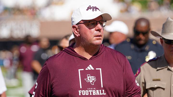 Texas A&M Aggies head coach Mike Elko leaves the field after the first half against the Missouri Tigers during the first half of the game at Faurot Field at Memorial Stadium. Texas A&M Aggies head coach Mike Elko leaves the field after the first half against the Missouri Tigers during the first half of the game at Faurot Field at Memorial Stadium.