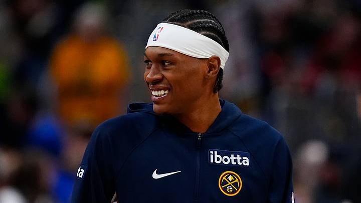 Mar 22, 2026; Denver, Colorado, USA; Denver Nuggets guard Peyton Watson (8) smiles before the game against the Portland Trail Blazers at Ball Arena. Mandatory Credit: Ron Chenoy-Imagn Images