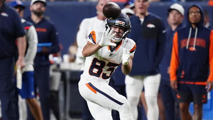 Aug 16, 2025; Denver, Colorado, USA; Denver Broncos wide receiver Michael Bandy (83) prepares to catch the ball in the second quarter against the Arizona Cardinals at Empower Field at Mile High. 