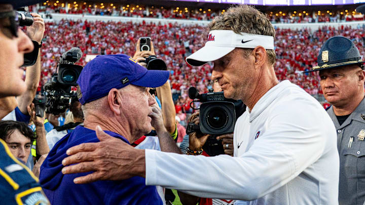 LSU head coach Brian Kelly and Ole Miss head coach Lane Kiffin shake hands after a college football game between Ole Miss and LSU at Vaught-Hemingway Stadium in Oxford, Miss., on Saturday, Sept. 27, 2025. Ole Miss defeated LSU 24-19.