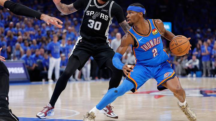 May 30, 2026; Oklahoma City, Oklahoma, USA; Oklahoma City Thunder guard Shai Gilgeous-Alexander (2) controls the ball against San Antonio Spurs forward Julian Champagnie (30) in the fourth quarter during game seven of the western conference finals for the 2026 NBA playoffs at Paycom Center. Mandatory Credit: Alonzo Adams-Imagn Images May 30, 2026; Oklahoma City, Oklahoma, USA; Oklahoma City Thunder guard Shai Gilgeous-Alexander (2) controls the ball against San Antonio Spurs forward Julian Champagnie (30) in the fourth quarter during game seven of the western conference finals for the 2026 NBA playoffs at Paycom Center. Mandatory Credit: Alonzo Adams-Imagn Images