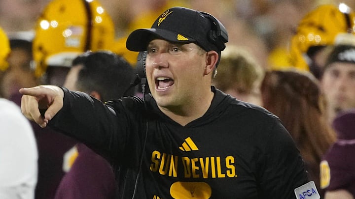 Arizona State head coach Kenny Dillingham calls out to his player against Wyoming at Sun Devil Stadium. Arizona State head coach Kenny Dillingham calls out to his player against Wyoming at Sun Devil Stadium.