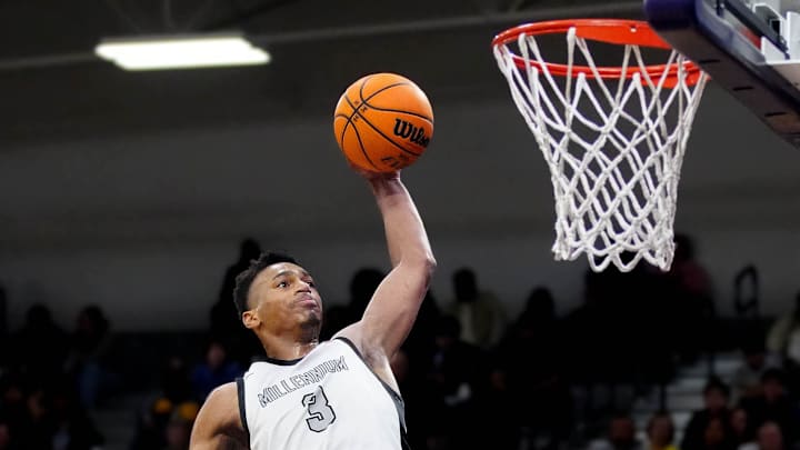January 23, 2025; Goodyear, Ariz.; USA; Millennium forward Cameron Holmes (3) dunks against Sunnyslope during a game at Millennium High School. January 23, 2025; Goodyear, Ariz.; USA; Millennium forward Cameron Holmes (3) dunks against Sunnyslope during a game at Millennium High School.
