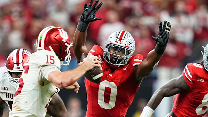 Ohio State Buckeyes linebacker Sonny Styles pressures Indiana Hoosiers quarterback Fernando Mendoza during the Big Ten championship game