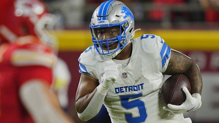 Oct 12, 2025; Kansas City, Missouri, USA; Detroit Lions running back David Montgomery (5) rushes the ball against the Kansas City Chiefs during the second half at GEHA Field at Arrowhead Stadium.