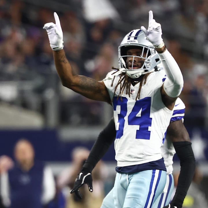 Dallas Cowboys cornerback Shavon Revel Jr. (34) celebrates after a play during the first half against the Minnesota Vikings.